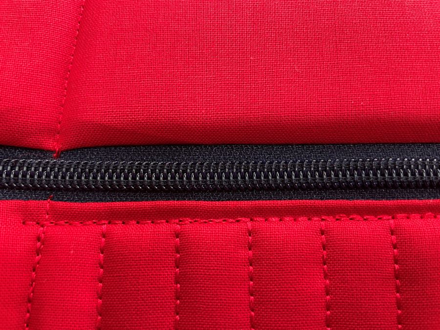 16 topstitch close to zipper.jpg